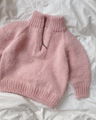 Lyserød Zipper Sweater Junior på dyne