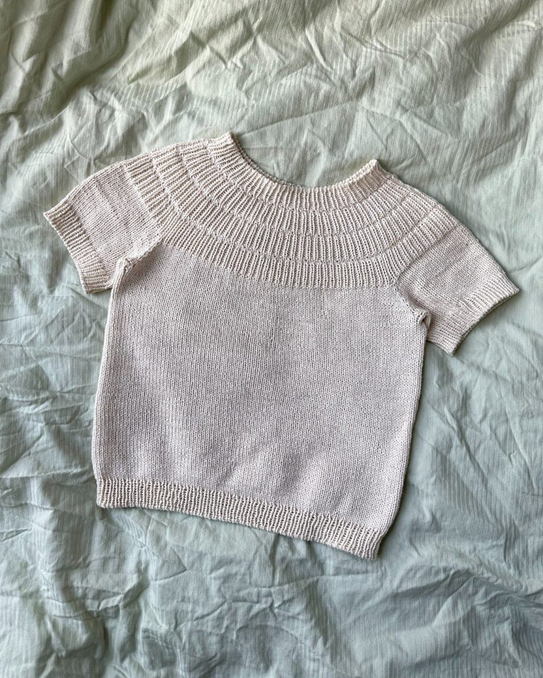 Detaljebillede af liggende hvid Ankers Sommerbluse