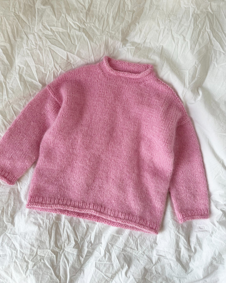 Closeup af blå Cloud Sweater Junior