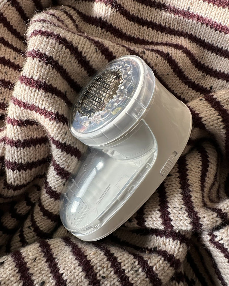 Lint Remover med børste ved siden af