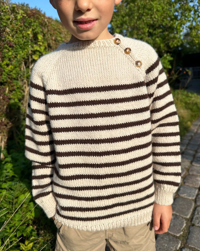 Barn iført sort og hvid Seaside Sweater
