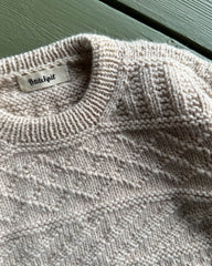 Detaljebillede af lysbeige Storm Sweater Junior 