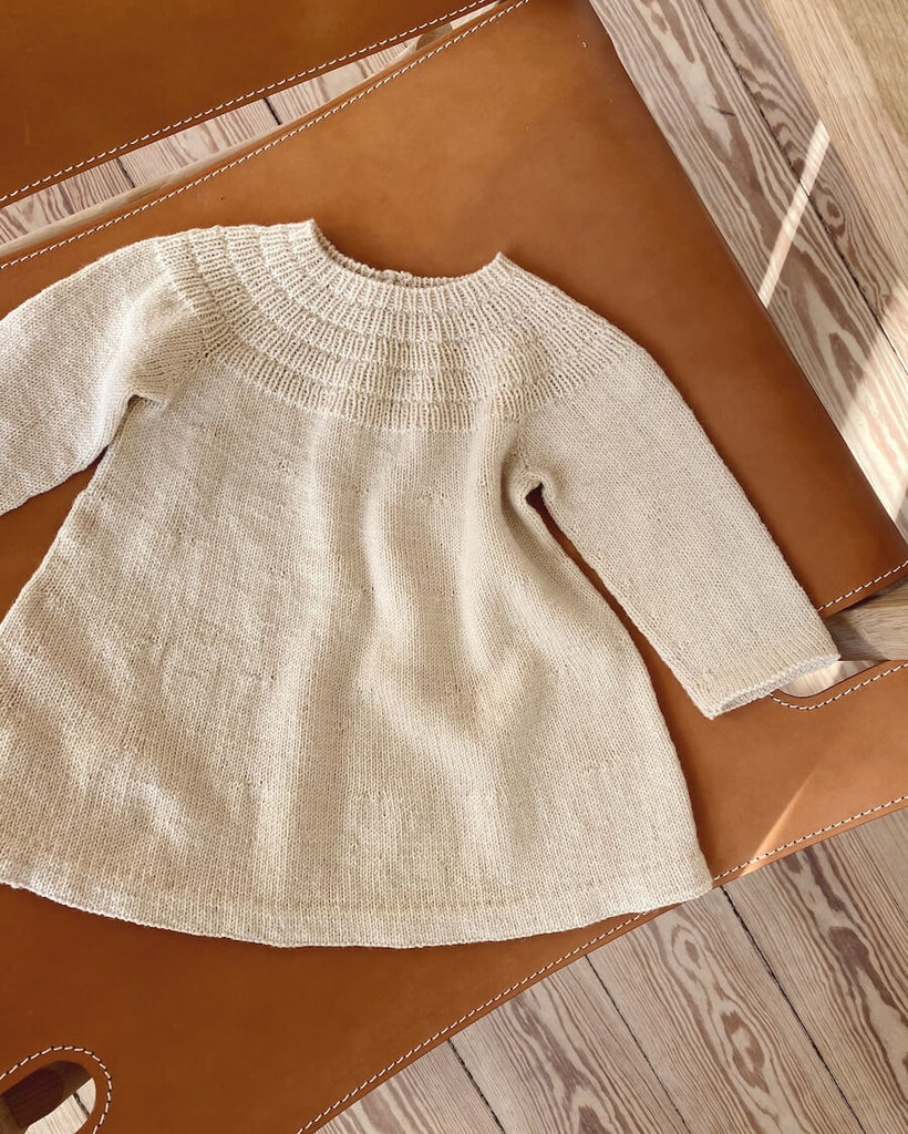 Liggende beige Ankers Kjole