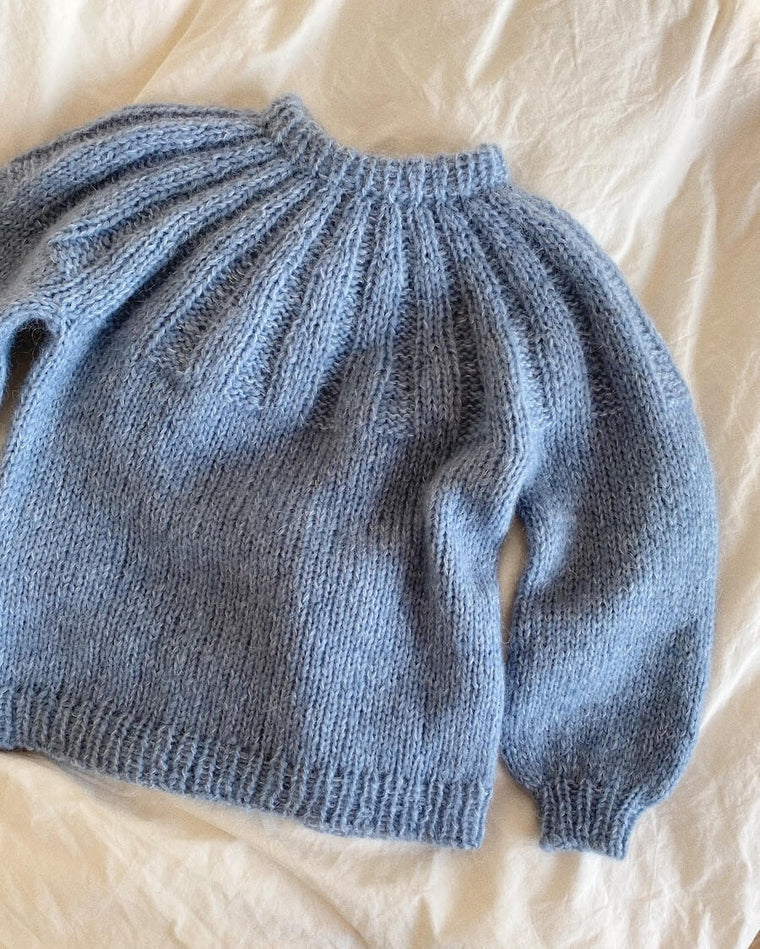 Detaljebillede af lyseblå Sunday Sweater Junior