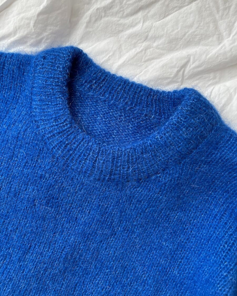 Detaljebillede af blå Stockholm Sweater Junior